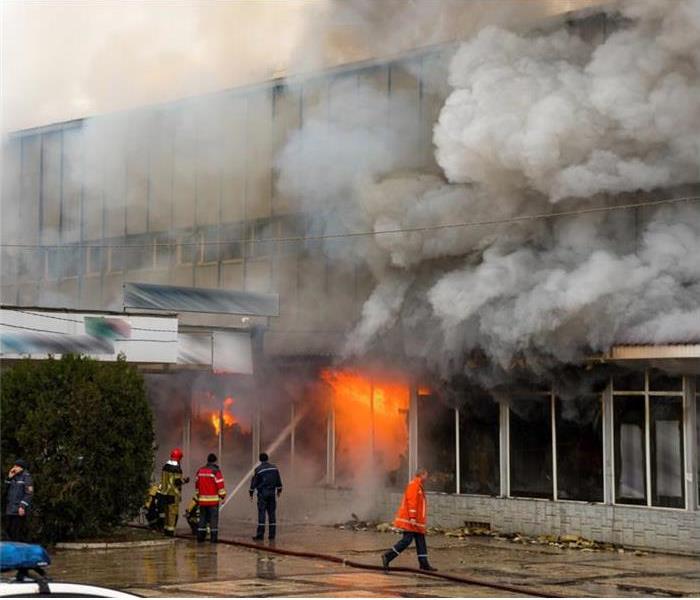 Fire Fighters fighting a fire at a commercial building